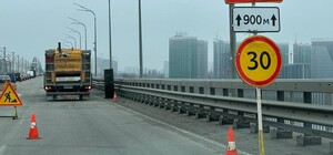 У Києві почали ремонтувати Дарницький міст - фото