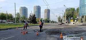 Дніпро оговтується після потужної зливи: комунальники ліквідовують наслідки негоди