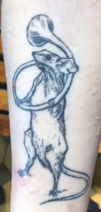 Тату на тілі загиблої. Фото поліції